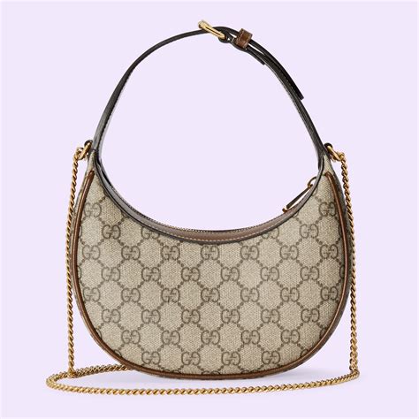 Gucci Borsa mini a mezzaluna su SUGAR 